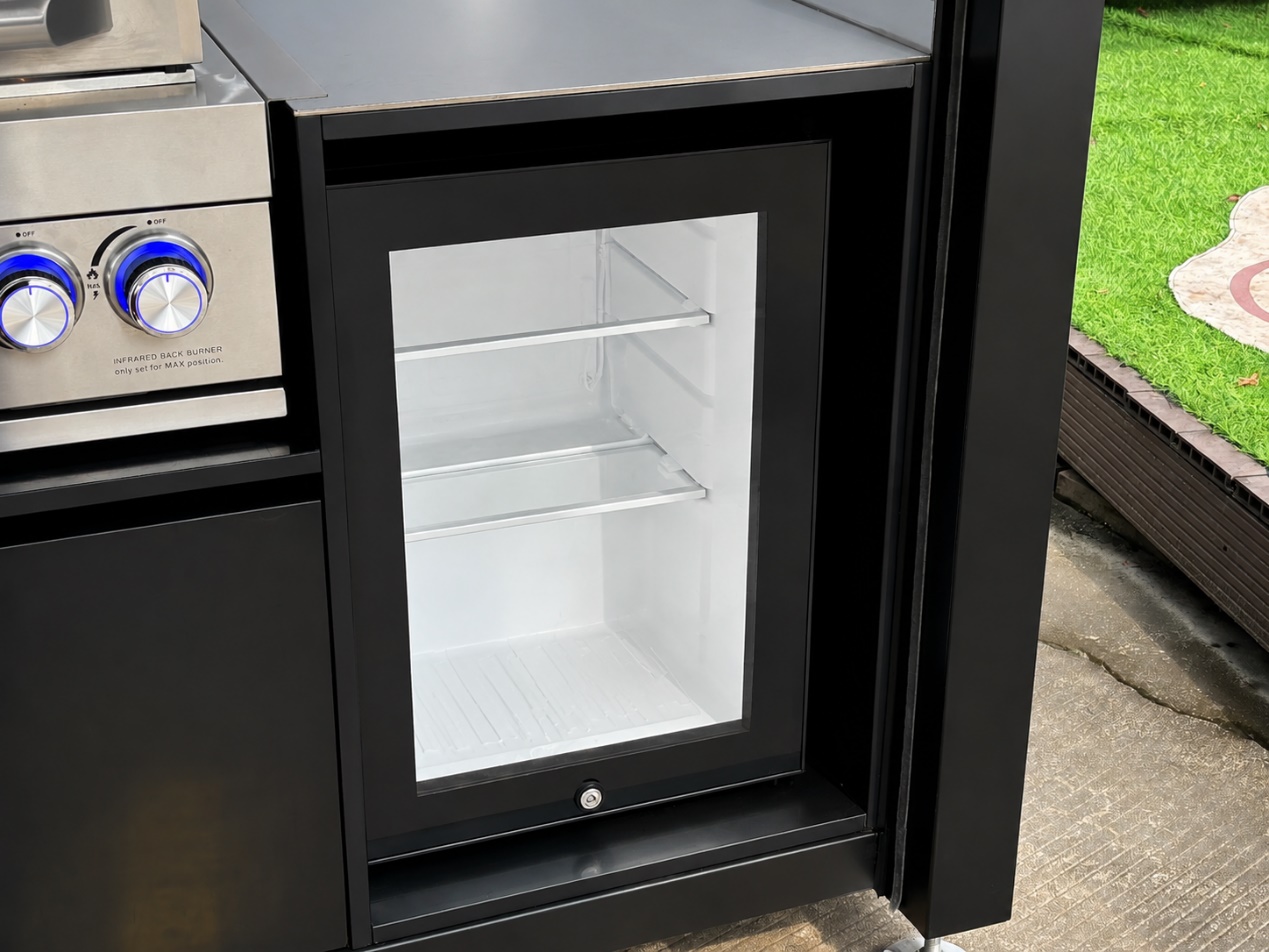 Refrigerated storage integrated into a modular outdoor kitchen cabinet